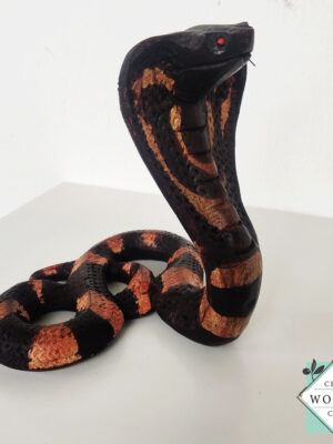 Hand-carved mahogany snake statue symbolizing rebirth and immortality. A unique, eco-friendly decor piece for boho, spiritual, or witchy spaces.