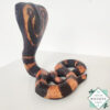 Hand-carved mahogany snake statue symbolizing rebirth and immortality. A unique, eco-friendly decor piece for boho, spiritual, or witchy spaces.