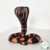 Hand-carved mahogany snake statue symbolizing rebirth and immortality. A unique, eco-friendly decor piece for boho, spiritual, or witchy spaces.
