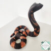 Hand-carved mahogany snake statue symbolizing rebirth and immortality. A unique, eco-friendly decor piece for boho, spiritual, or witchy spaces.