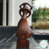 Hand-carved wooden lovers statue made from mahogany. A romantic anniversary gift with optional free engraving. Available in two sizes. 100% handmade.