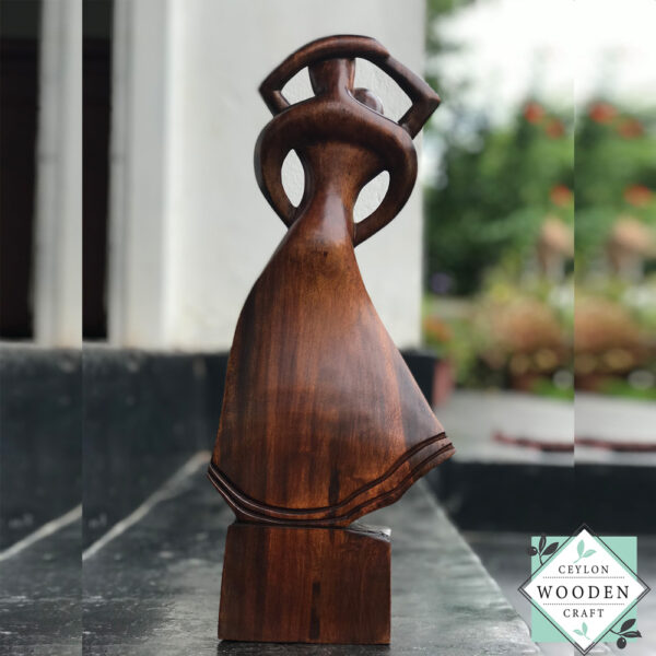 Hand-carved wooden lovers statue made from mahogany. A romantic anniversary gift with optional free engraving. Available in two sizes. 100% handmade.