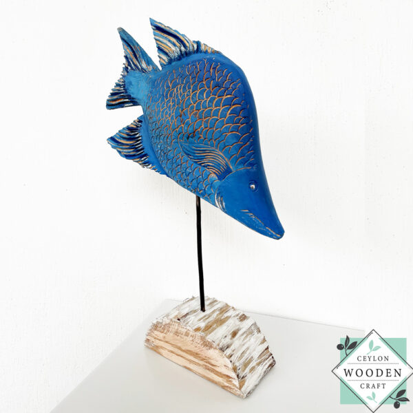 Hand-carved wooden tropical blue fish on stand. Perfect for coastal, beach house, or nautical decor. Eco-friendly and artisan-made.