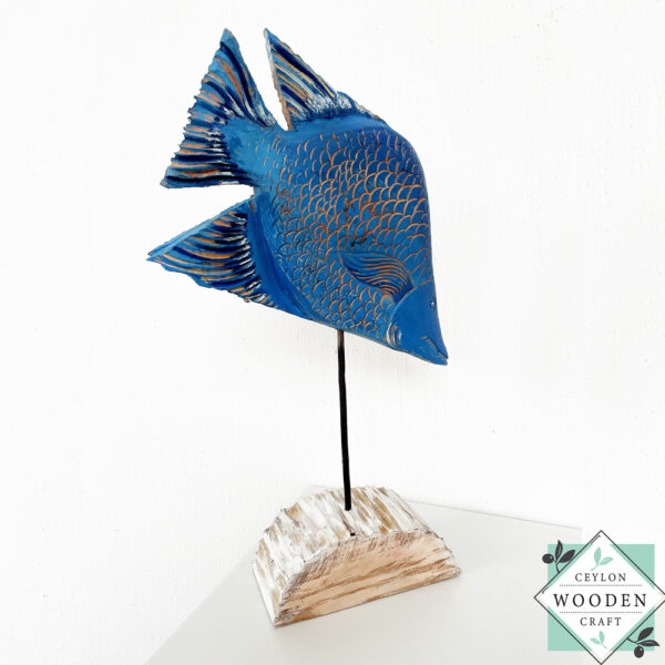 Hand-carved wooden tropical blue fish on stand. Perfect for coastal, beach house, or nautical decor. Eco-friendly and artisan-made.