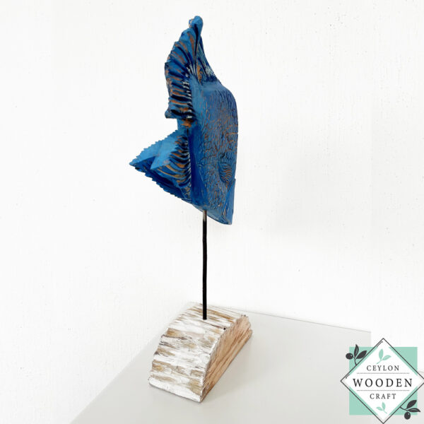 Hand-carved wooden tropical blue fish on stand. Perfect for coastal, beach house, or nautical decor. Eco-friendly and artisan-made.