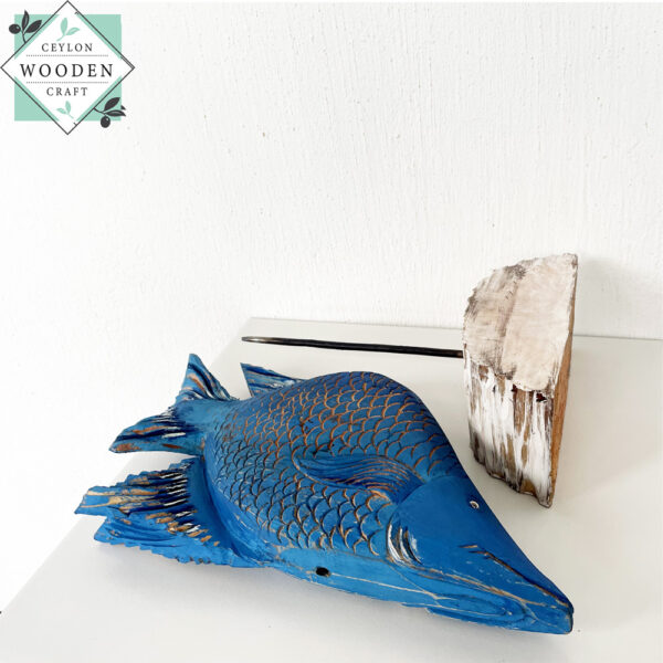 Hand-carved wooden tropical blue fish on stand. Perfect for coastal, beach house, or nautical decor. Eco-friendly and artisan-made.