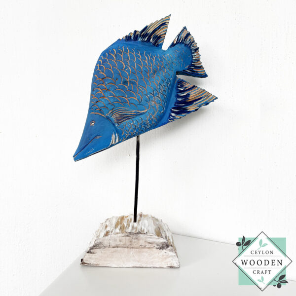 Hand-carved wooden tropical blue fish on stand. Perfect for coastal, beach house, or nautical decor. Eco-friendly and artisan-made.