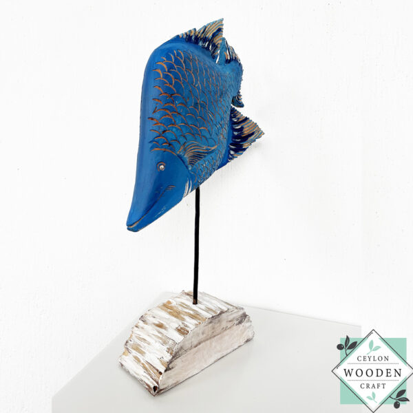 Hand-carved wooden tropical blue fish on stand. Perfect for coastal, beach house, or nautical decor. Eco-friendly and artisan-made.