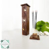 Handcrafted mahogany incense holder with hidden design. Holds up to 4 sticks. Ideal for meditation, aromatherapy, and elegant home decor.
