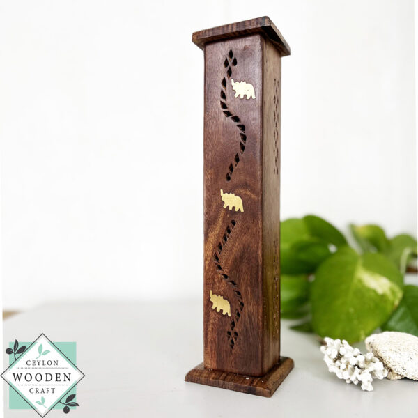 Handcrafted mahogany incense holder with hidden design. Holds up to 4 sticks. Ideal for meditation, aromatherapy, and elegant home decor.