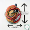 Inspired by Sri Lanka’s traditional Bihiri Sanni masks, this hand-carved and hand-painted wooden snake mask brings boho charm and cultural depth to any wall space.