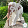 This hand-carved wooden white elephant sculpture features fine detailing and elegant tusks. A beautiful, eco-friendly decor piece and a meaningful gift for any occasion.