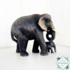 Hand-carved mahogany elephant mother and baby sculpture. Symbolizes love, luck, and strength. A perfect handmade gift or decorative accent.