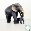 Hand-carved mahogany elephant mother and baby sculpture. Symbolizes love, luck, and strength. A perfect handmade gift or decorative accent.