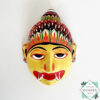 Authentic Ceylon Sanni mask - handcrafted yellow wooden cultural wall decor from Sri Lanka. Traditional Dewa Sanni healing mask by skilled artisans. Collectible art.