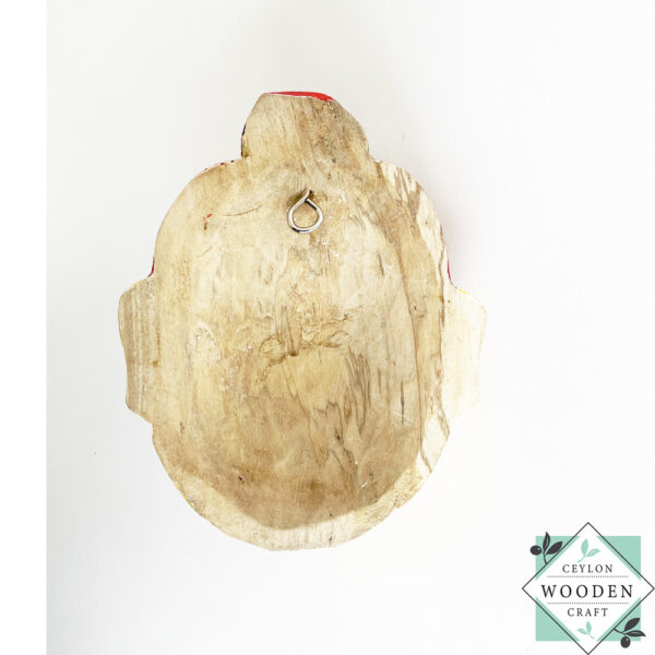 Authentic Ceylon Sanni mask - handcrafted yellow wooden cultural wall decor from Sri Lanka. Traditional Dewa Sanni healing mask by skilled artisans. Collectible art.
