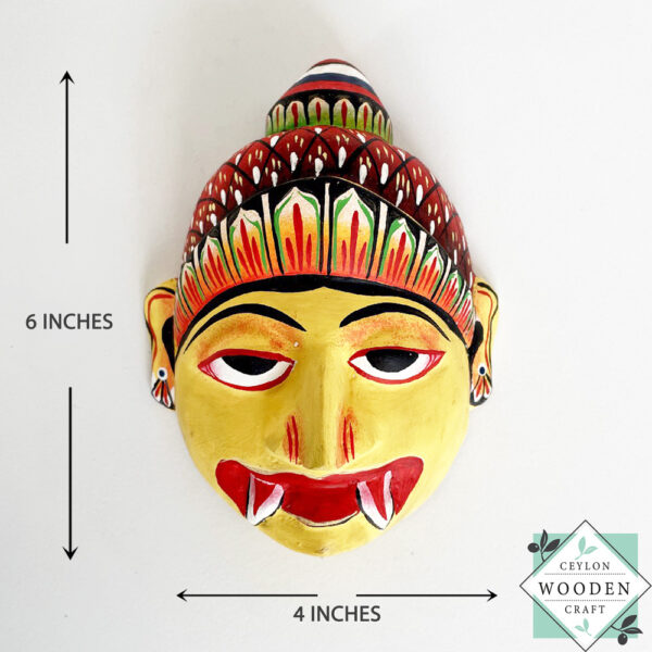 Authentic Ceylon Sanni mask - handcrafted yellow wooden cultural wall decor from Sri Lanka. Traditional Dewa Sanni healing mask by skilled artisans. Collectible art.