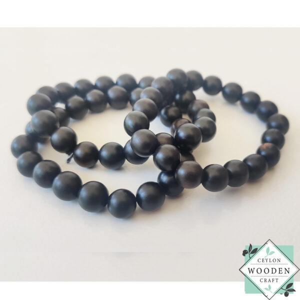 Handcrafted ebony wood bracelet with natural black finish. Premium wooden bangle for boho style & meditation. 3.5" diameter fits all sizes. Eco-friendly jewelry.