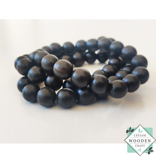 Handcrafted ebony wood bracelet with natural black finish. Premium wooden bangle for boho style & meditation. 3.5" diameter fits all sizes. Eco-friendly jewelry.