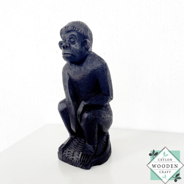 Hand carved mahogany monkey sculpture with black finish. Premium wooden decor statue symbolizing creativity & intelligence. 9" artisan-crafted home accent piece.