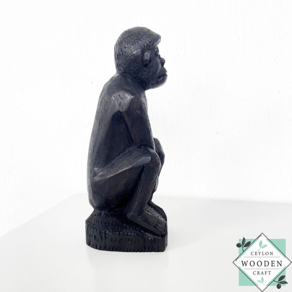 Hand carved mahogany monkey sculpture with black finish. Premium wooden decor statue symbolizing creativity & intelligence. 9" artisan-crafted home accent piece.